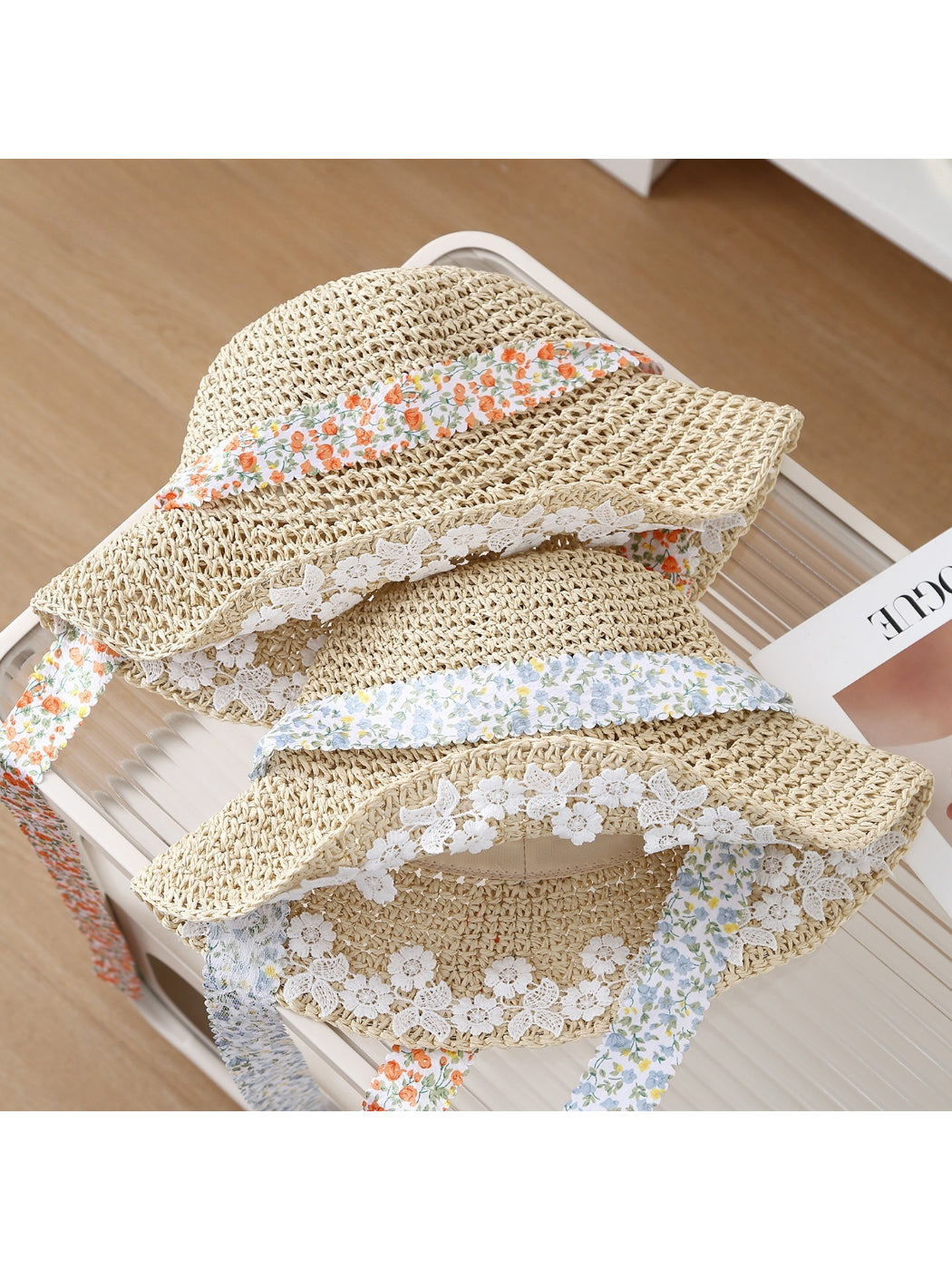 Side view of Haila lace trim floral band bucket hat showing floral pattern and lace detail