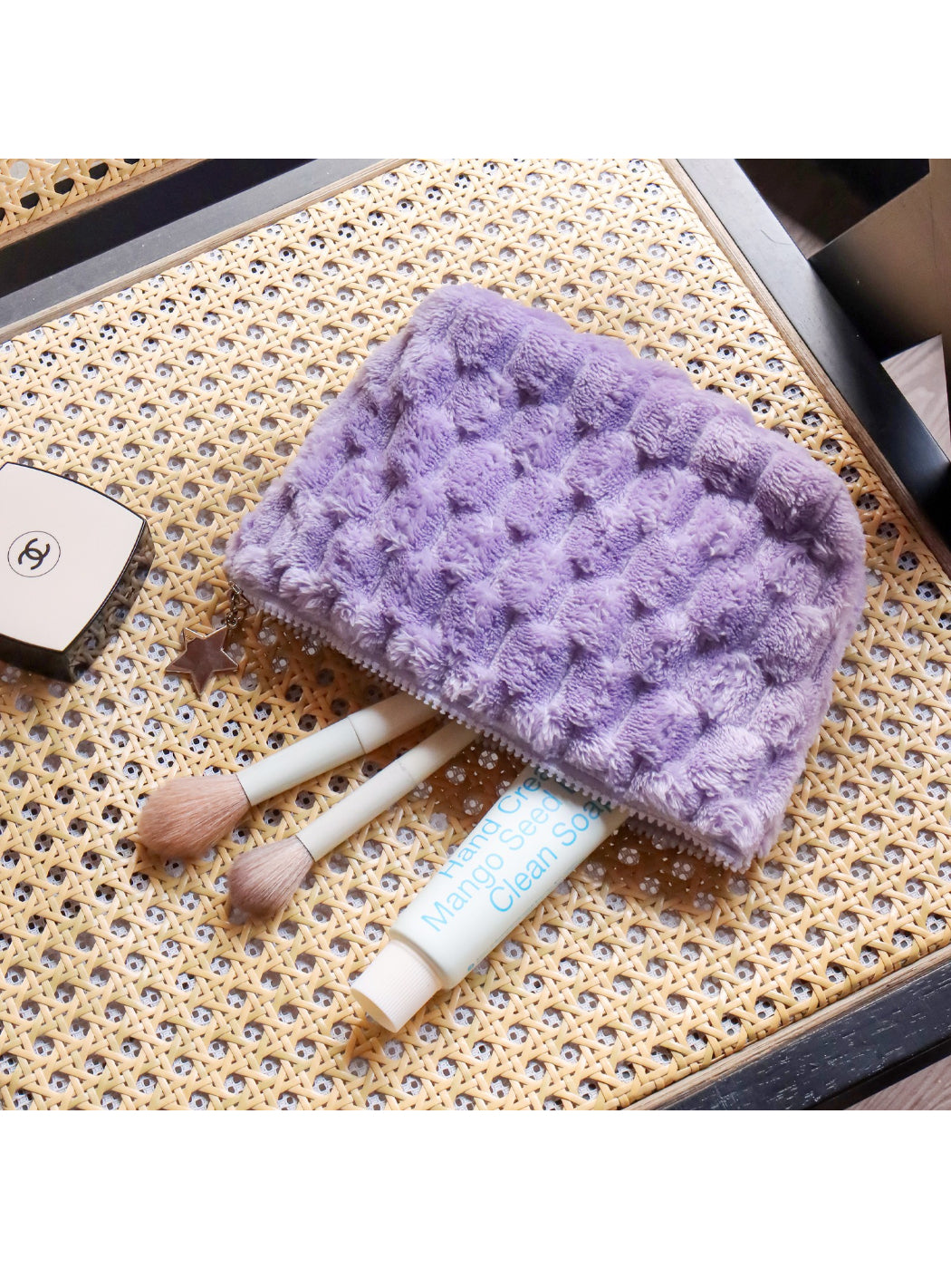 Cosbai fuzzy makeup pouch displayed flat showing soft texture and star pendant