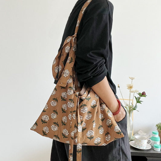 Floral tie handle shoulder bag with soft casual shape