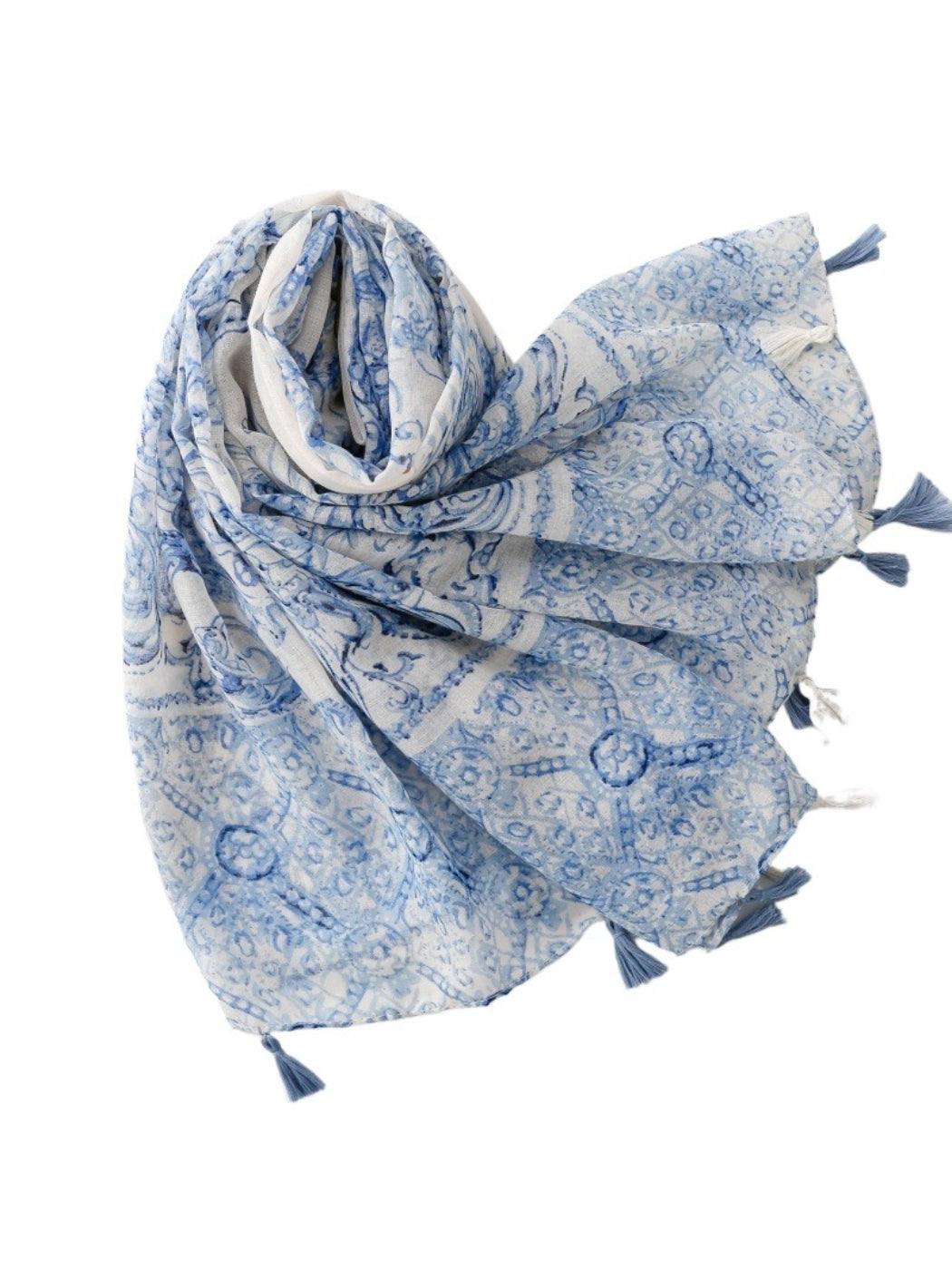 Model wearing blue baroque tassel scarf styled around neck