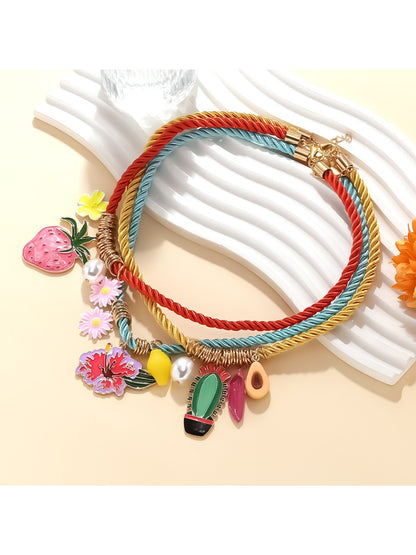 Close-up of Neckit Summer Charm Necklace showing colorful fruit and floral charms