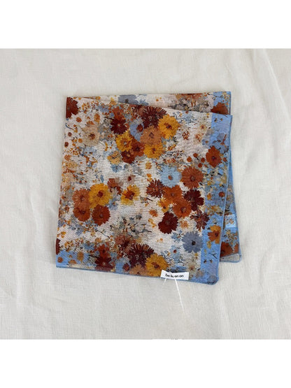 Scarvii vintage floral square scarf folded neatly with visible floral pattern edges