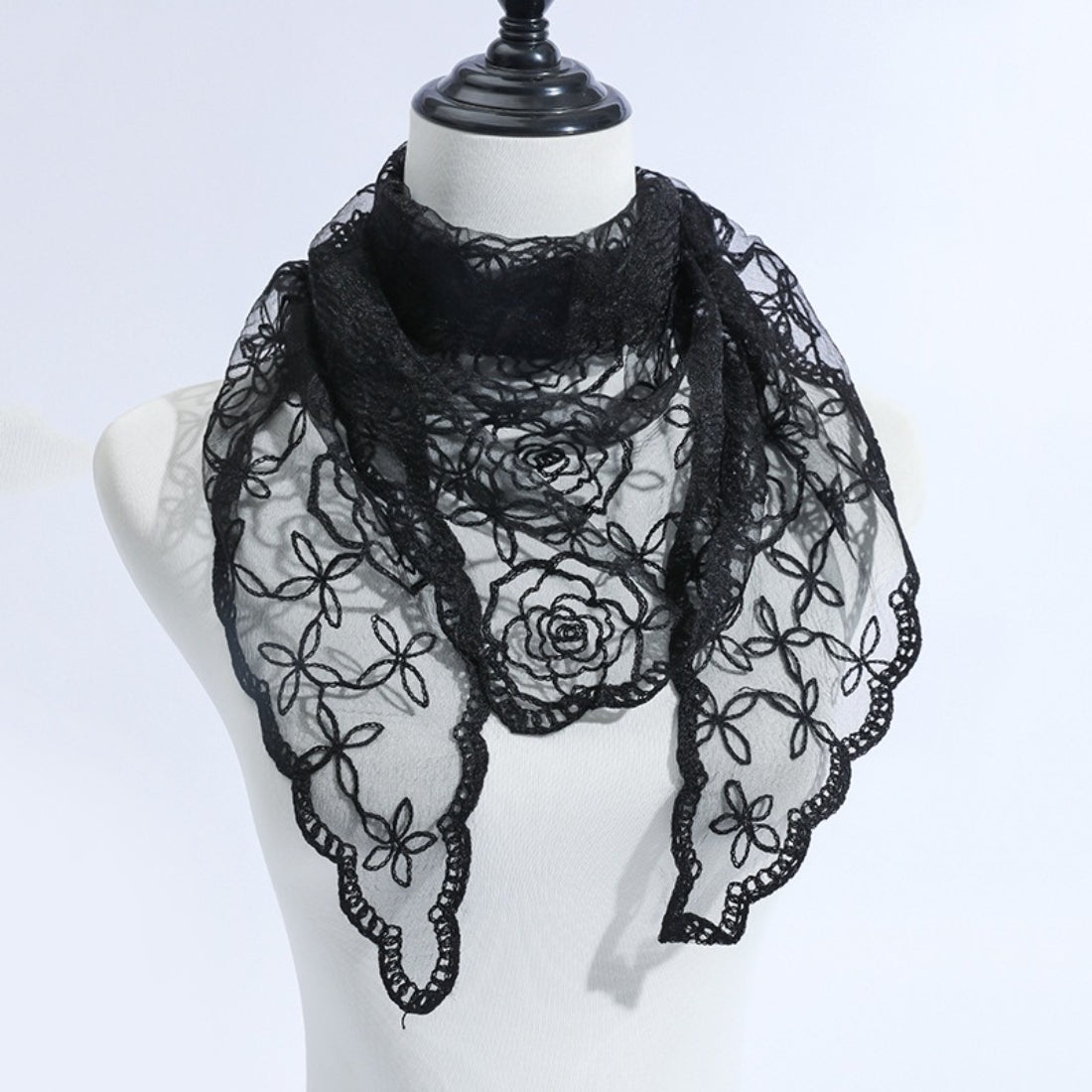 Close-up of delicate rose vine lace pattern on Haila veil scarf in blush pink