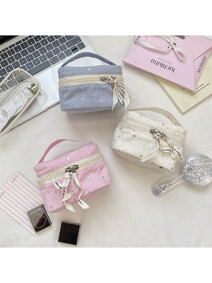 Cosbai cosmetic makeup bag with star print on a white background