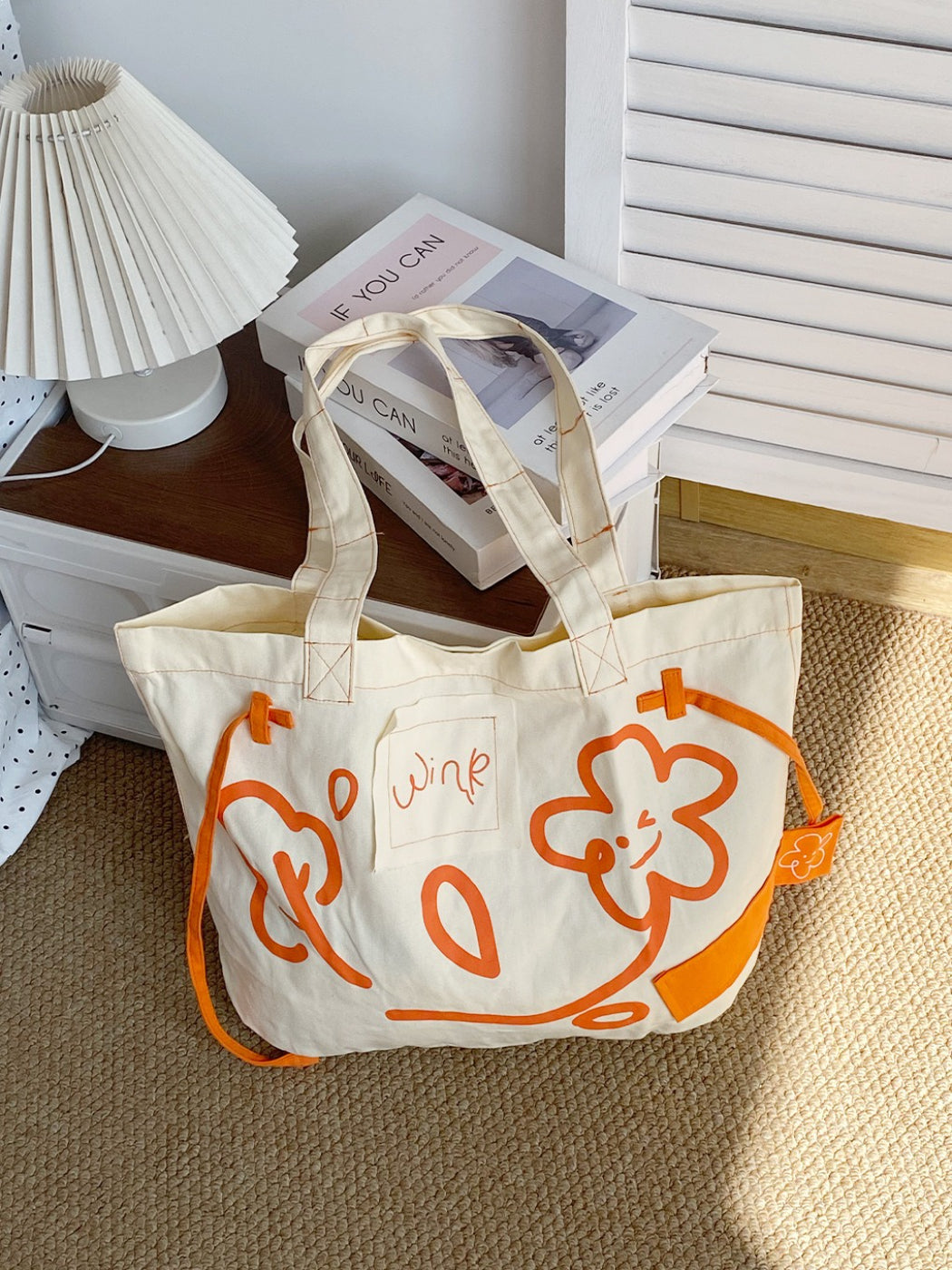 Side view of Cosbai Graphic Everyday Large Tote displaying spacious interior and sturdy handles