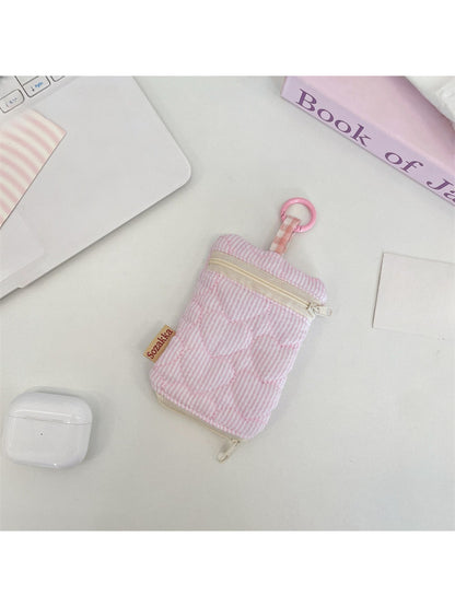 Cosbai Mini Zipper Key Pouch clipped to a belt loop on jeans