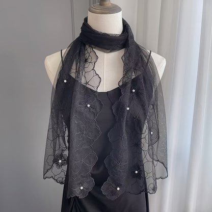 Model wearing Scarvii floral lace pearl trim scarf styled with a white blouse