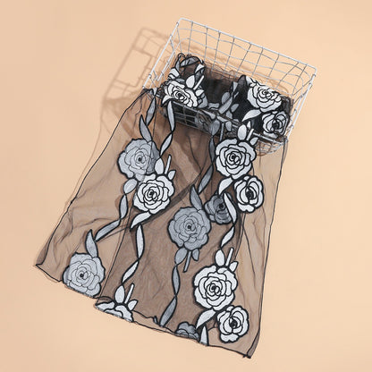 Scarvii sheer rose mesh scarf styled around a model's neck