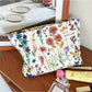 Cosbai Wildflower Cosmetic Bag lying flat highlighting the wildflower pattern