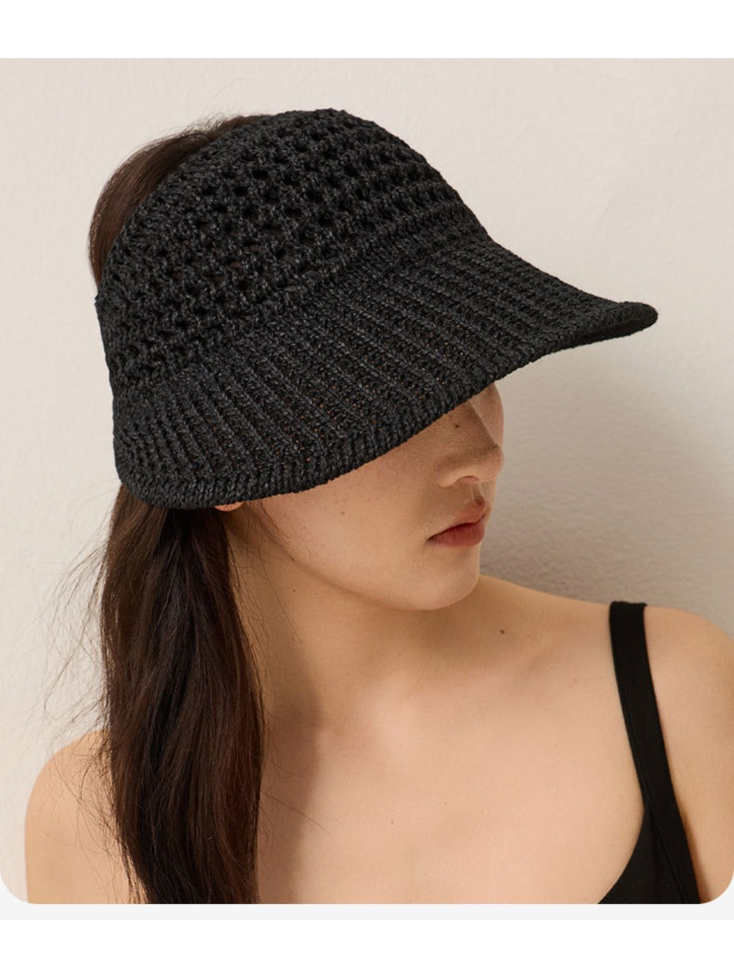 Haila open knit wide brim sun hat folded to show flexibility and knit detail