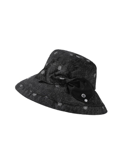 Side view of Haila polka dot bow brim hat highlighting large bow detail