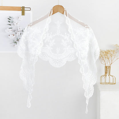 Haila triangle veil scarf styled as a head covering with delicate lace edges