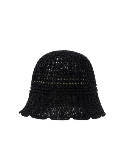Close-up of the open knit texture and stitching details on the Haila bucket hat