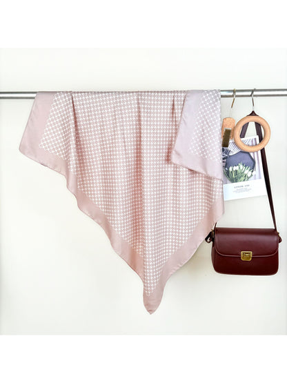Scarvii Soft Geo Bandana Square Scarf worn as a headband with geometric print visible