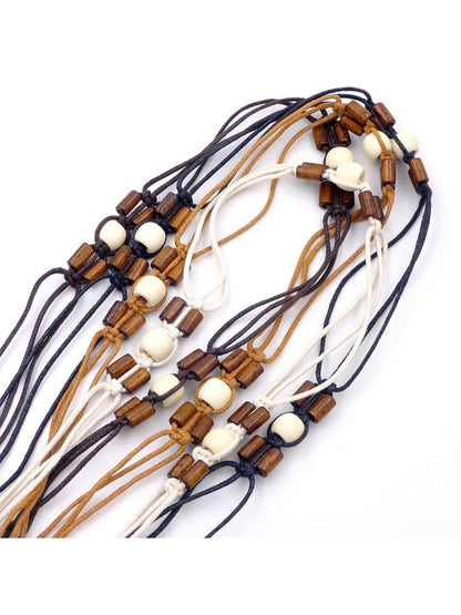 Beco Boho rope beaded tie belt displayed flat with tassel ends