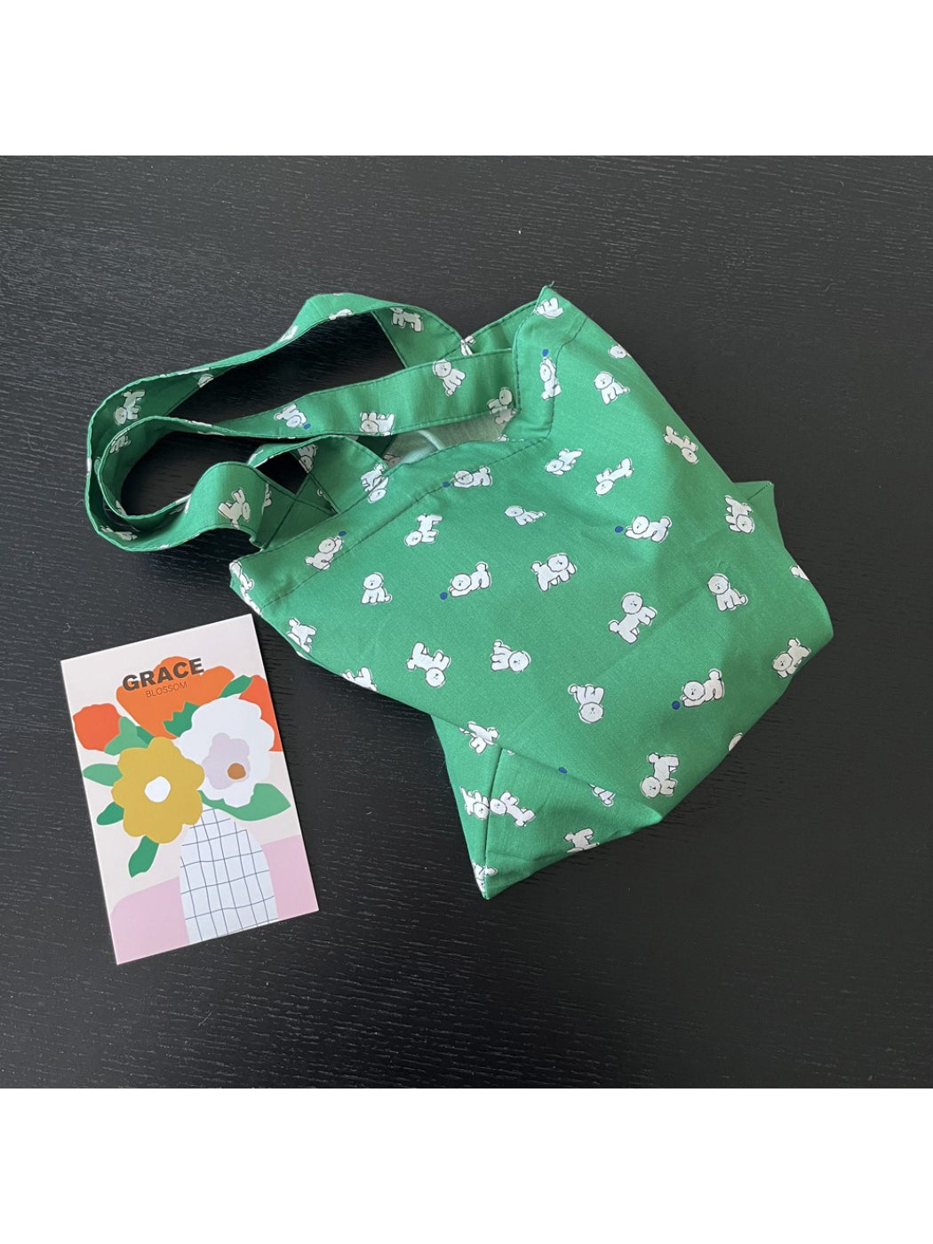 Back view of green slouch tote bag with plain fabric