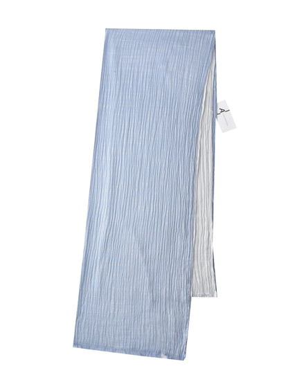Model holding Scarvii summer styling Farmhouse Scarf showing its size and drape