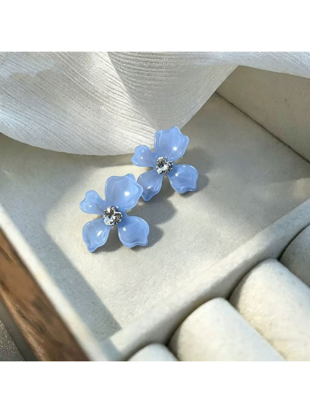 Earwish floral stud earrings displayed on a white background highlighting soft colors
