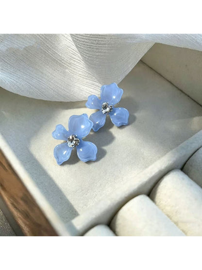 Earwish floral stud earrings displayed on a white background highlighting soft colors