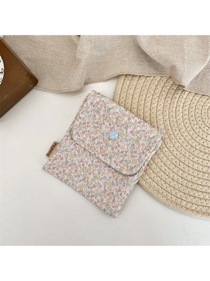 Cosbai Floral Print Coin Pouch held to show compact size and floral design