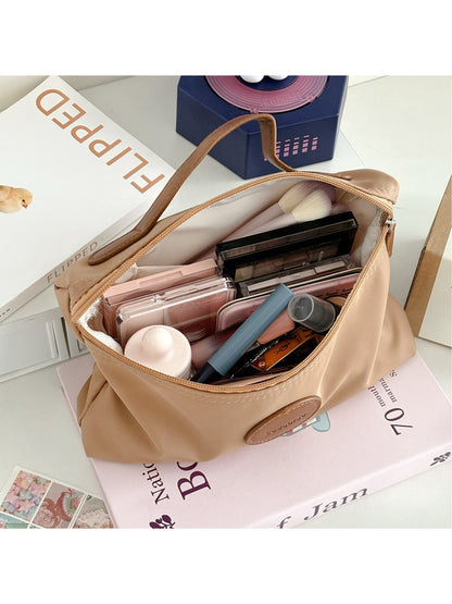 Cosbai travel pouch open showing spacious interior for toiletries