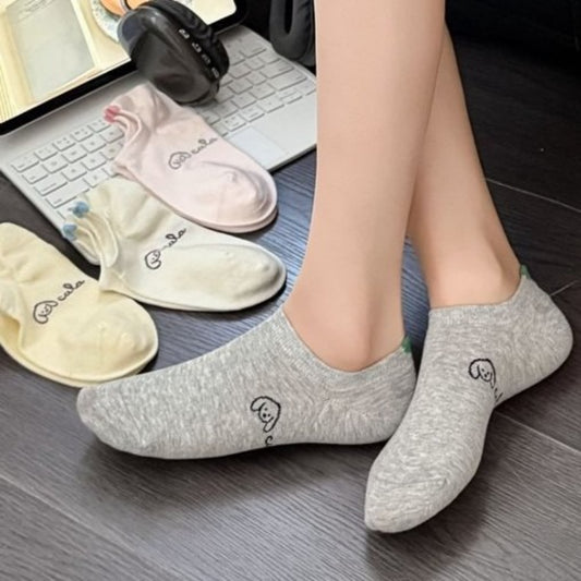 Pair of Rufia Soft Spot low cut socks in white with subtle ribbed texture