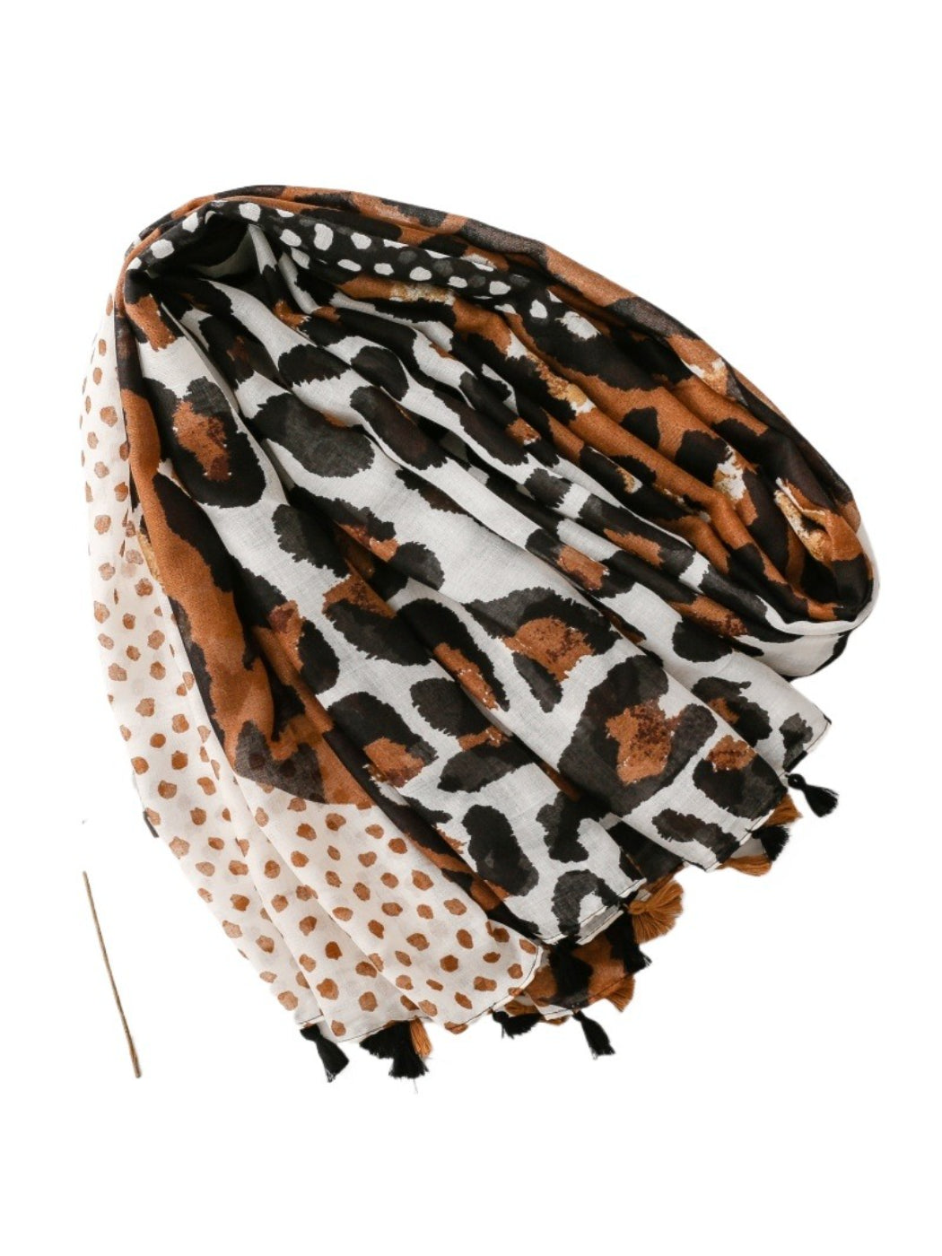 Model wearing leopard spot fringe wrap draped over shoulders with casual outfit
