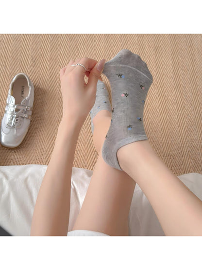 Model wearing Rufia Everyday Bloom no show socks paired with casual shoes