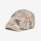Top view of Haila vintage flat cap highlighting gold foil pattern