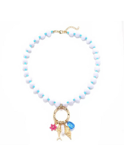 Side view of Neckit beaded necklace highlighting the ring charm detail