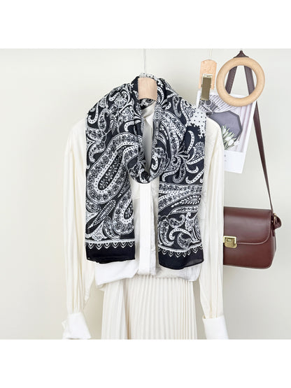 Close-up of Scarvii Classic Paisley Neck Scarf fabric texture and detailed paisley design