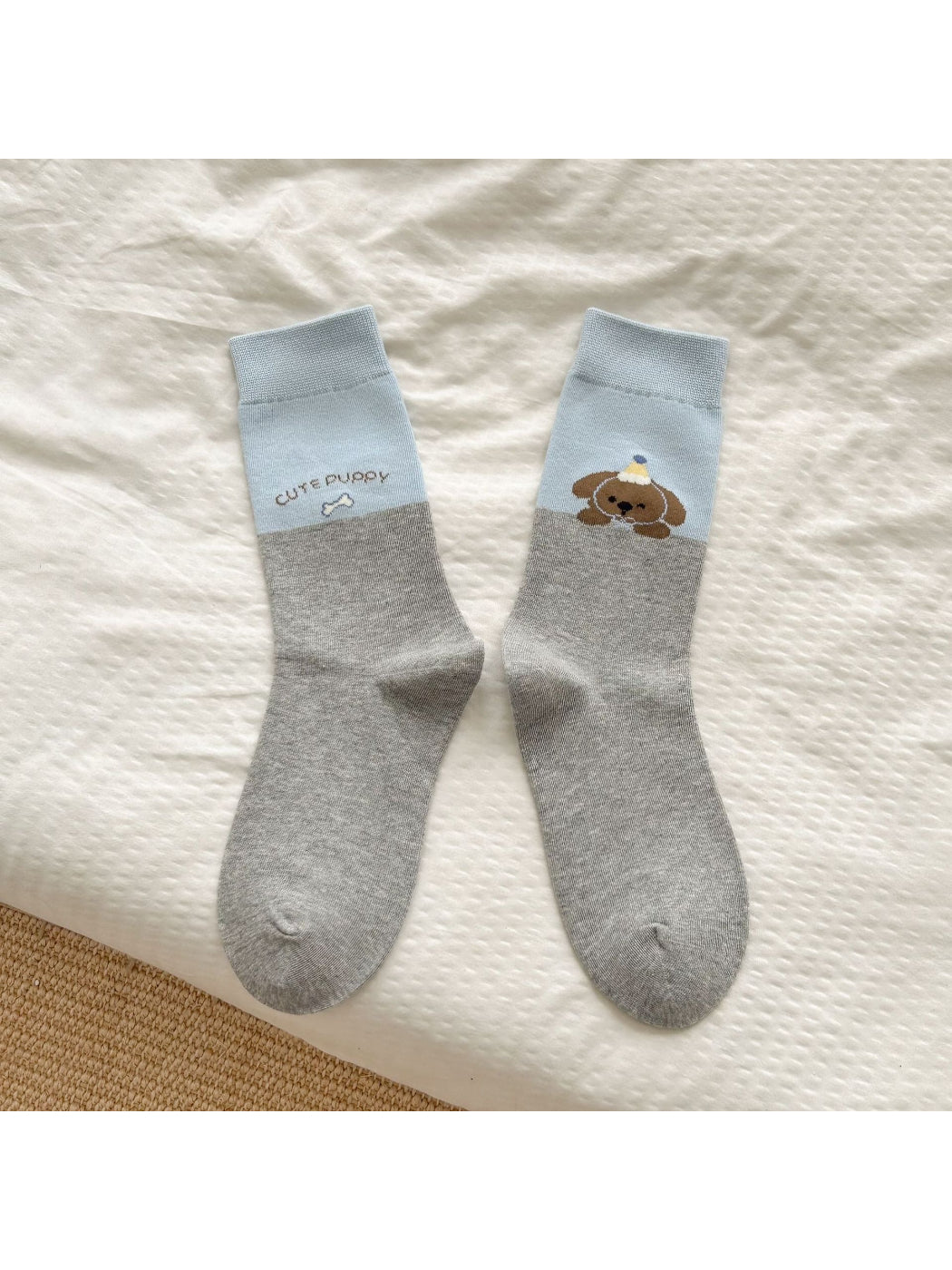 Model wearing Rufia soft animal motif crew socks with brown bear design