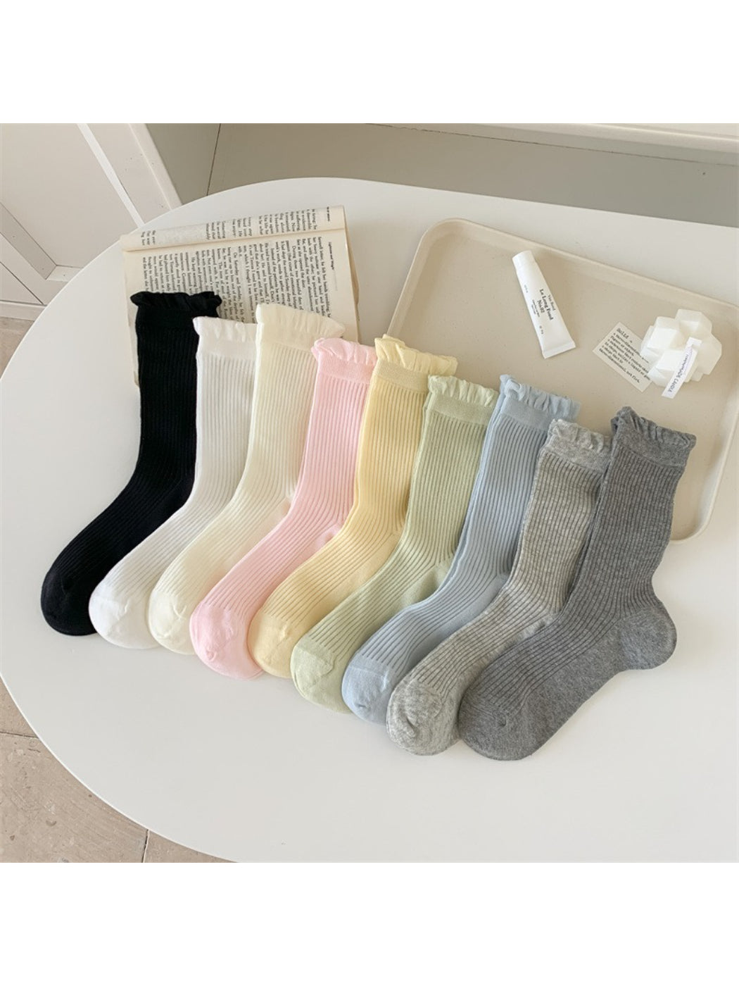 Close-up of ruffle cuff detail on Rufia Everyday Crew Socks in light pink