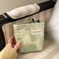 Close-up of Cosbai blush floral cosmetic bag showing detailed floral print