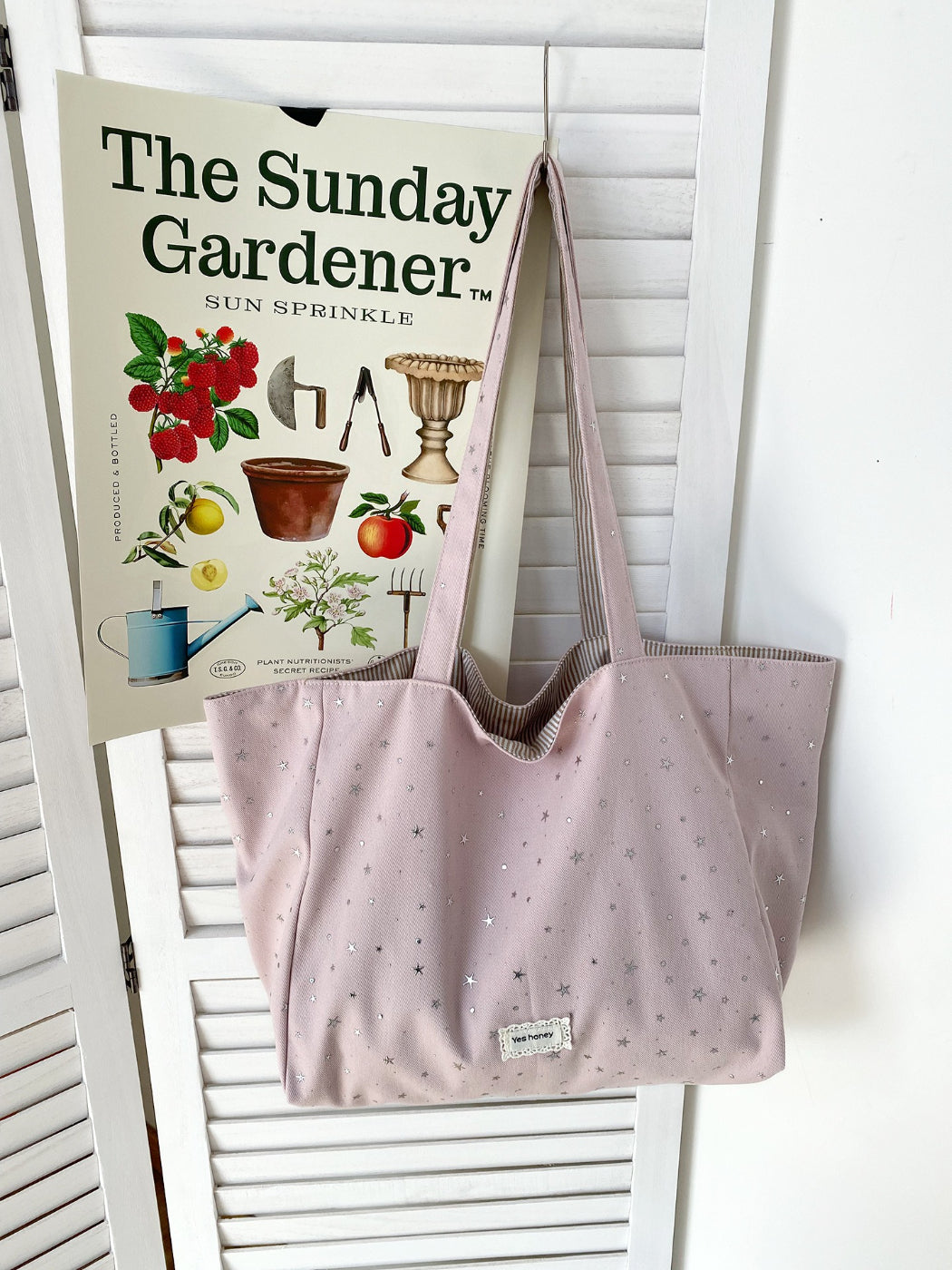 Cosbai Star Print Soft Shoulder Tote worn on shoulder by model outdoors