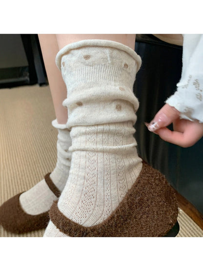 Rufia ruffle mesh dot mid-calf socks laid out to display full length and design