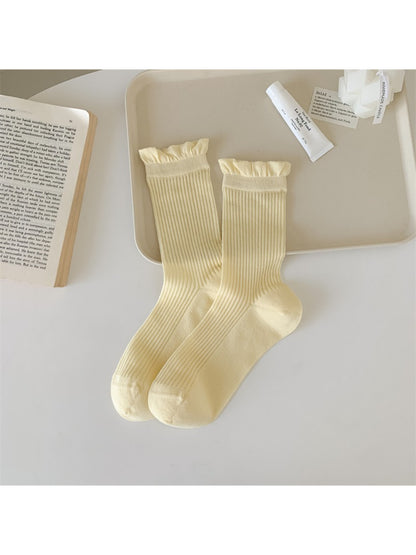 Rufia Everyday Ruffle Cuff Crew Socks in white with delicate ruffle cuff detail