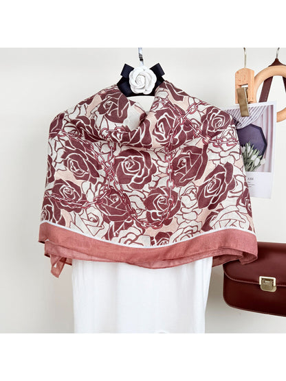 Close-up of Scarvii Rose Chain Wrap Scarf fabric texture and detailed rose print