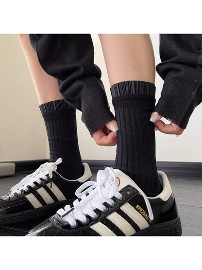 Close-up of Rufia Pleated Cuff Crew Socks highlighting lace stripe detail
