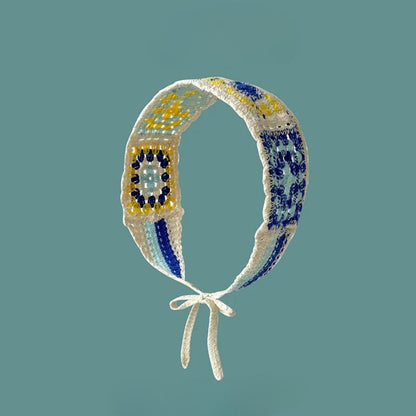 Haila crochet summer headband styled on a mannequin head
