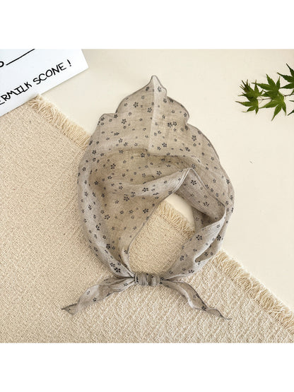 Scarvii lightweight textured tie head scarf displayed flat showing full length