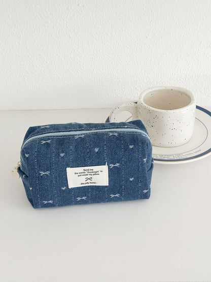 Cosbai denim makeup pouch standing upright partially open