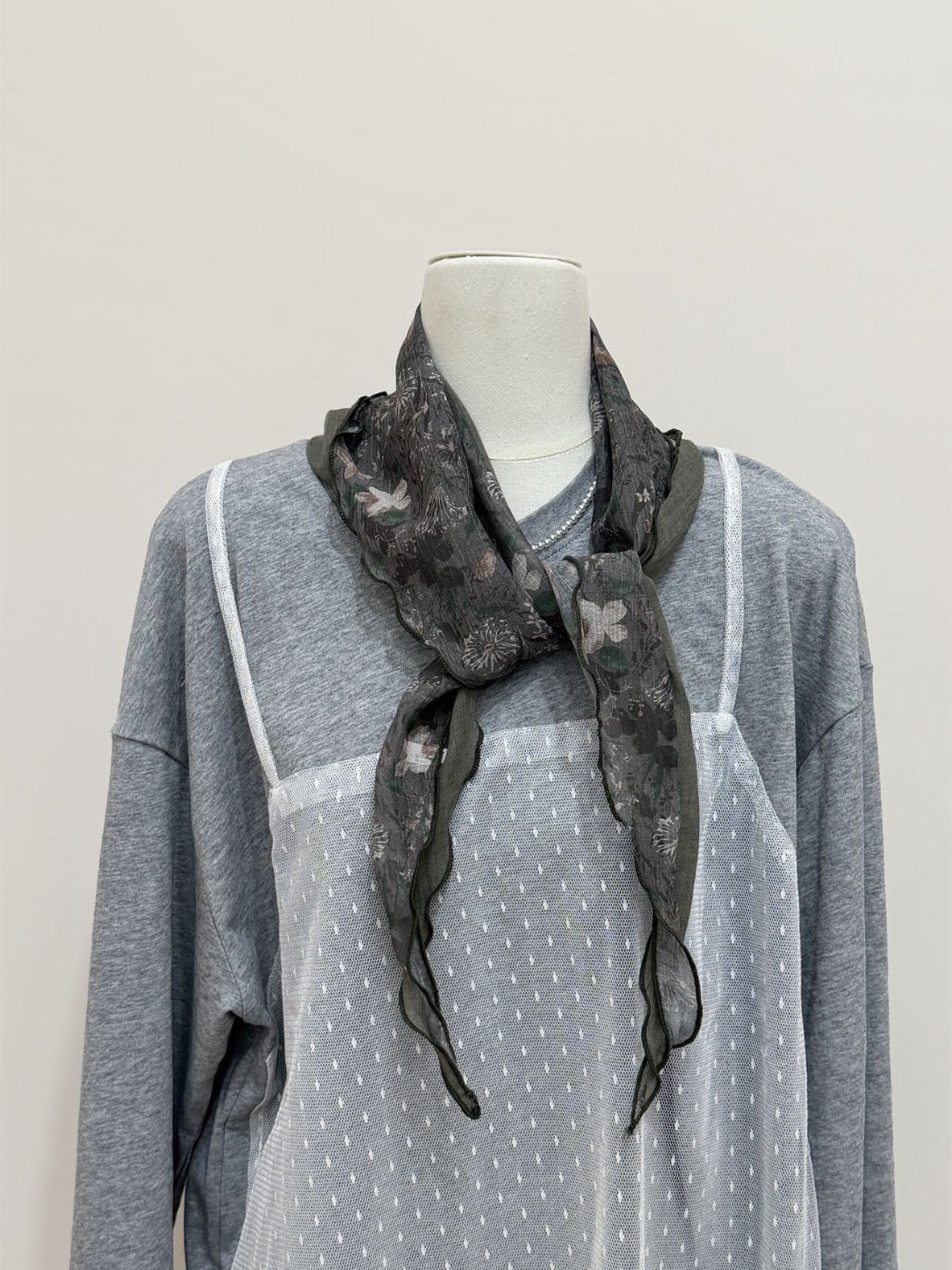 Scarvii boho floral triangle bandana scarf folded in triangle shape showing pattern