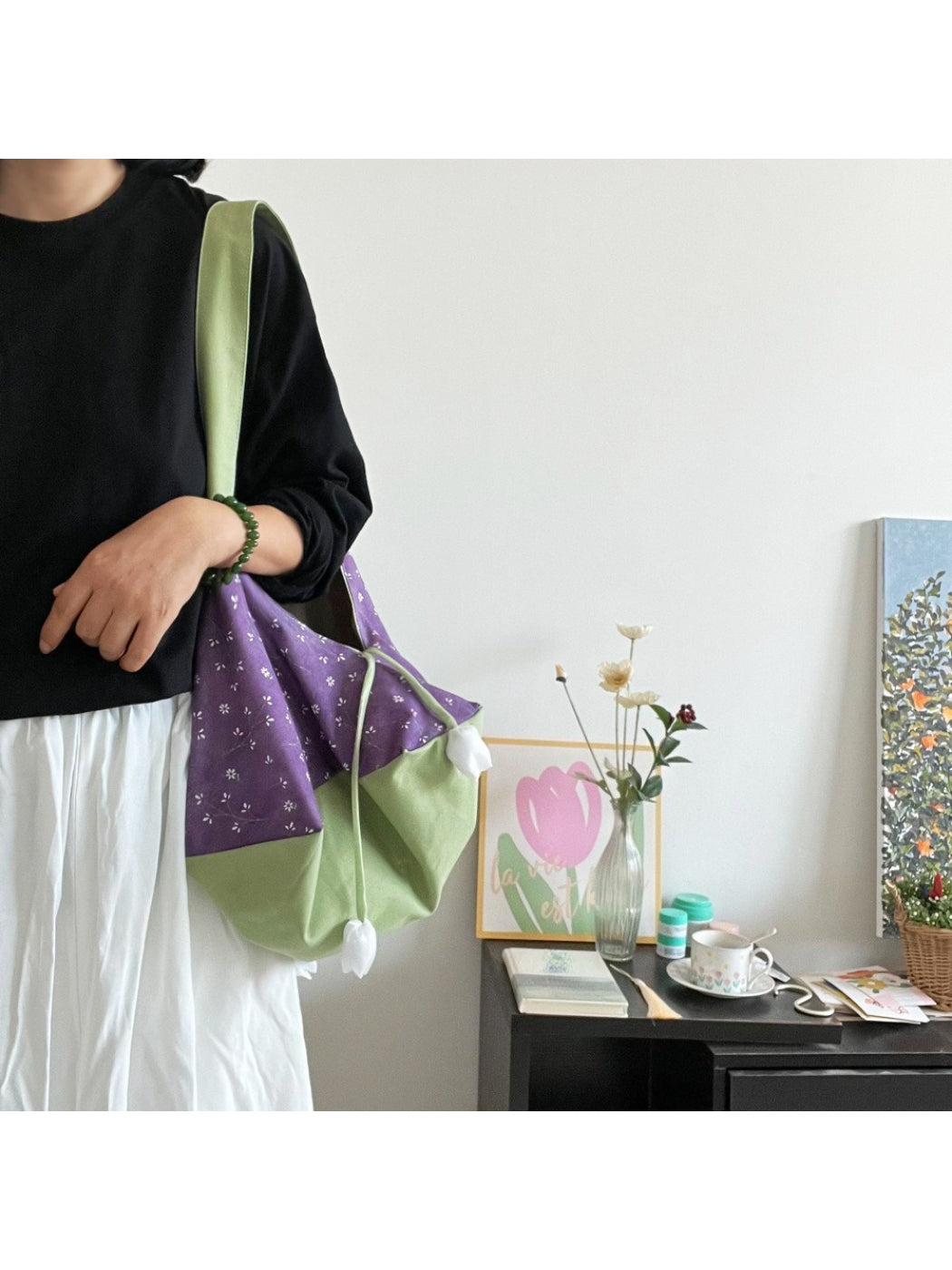 Side view of Cosbai Tulip Charm two-tone slouch bag showing soft leather texture