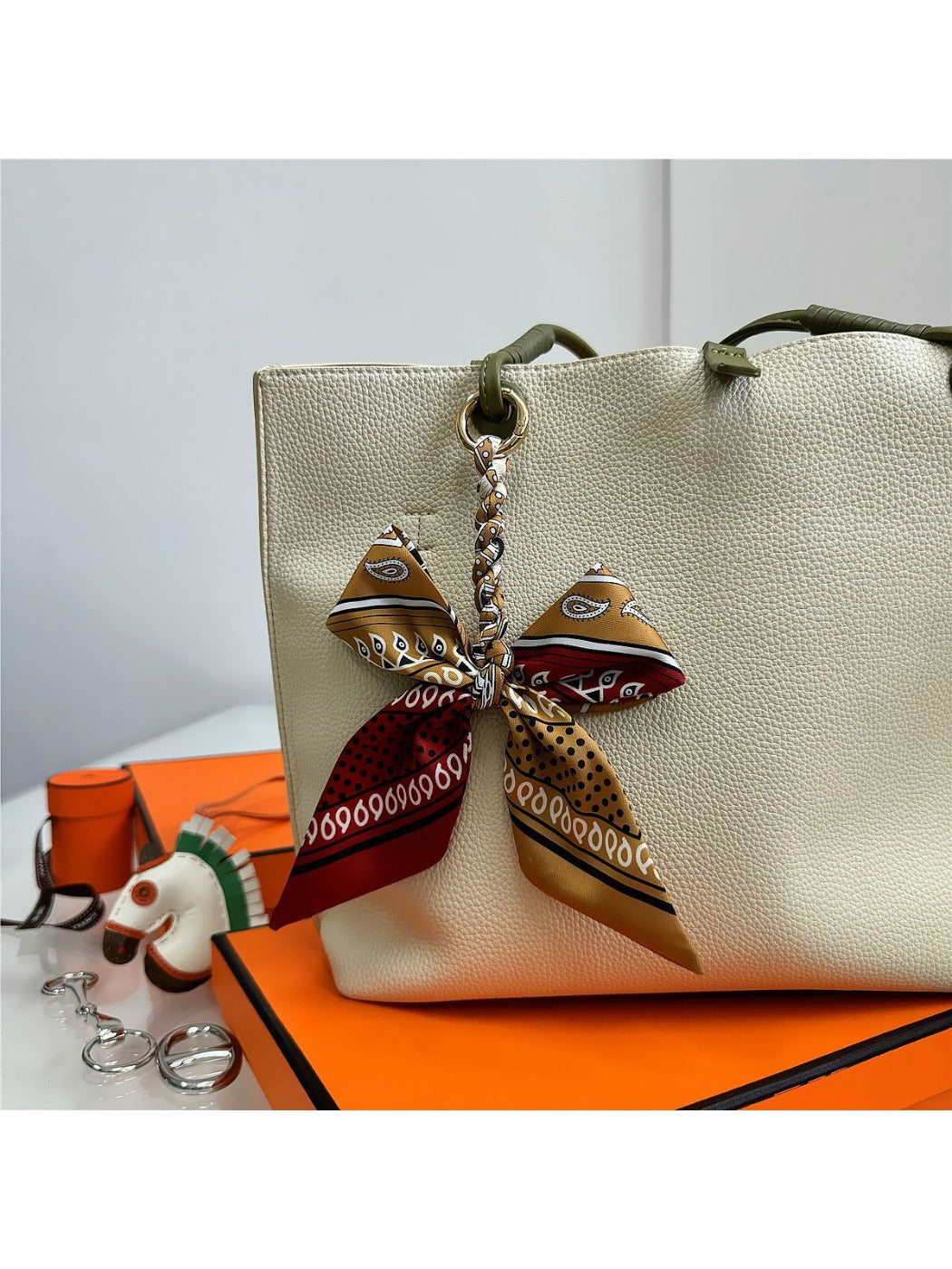 Koco Elegant Bow Bag Charm color options including White, Blue, Brown