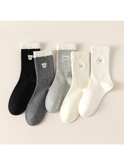 Pair of Rufia soft teddy detail ribbed socks in beige laid flat