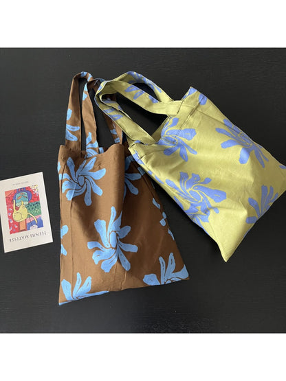 Cosbai abstract floral reusable tote bag with colorful flower design on white background