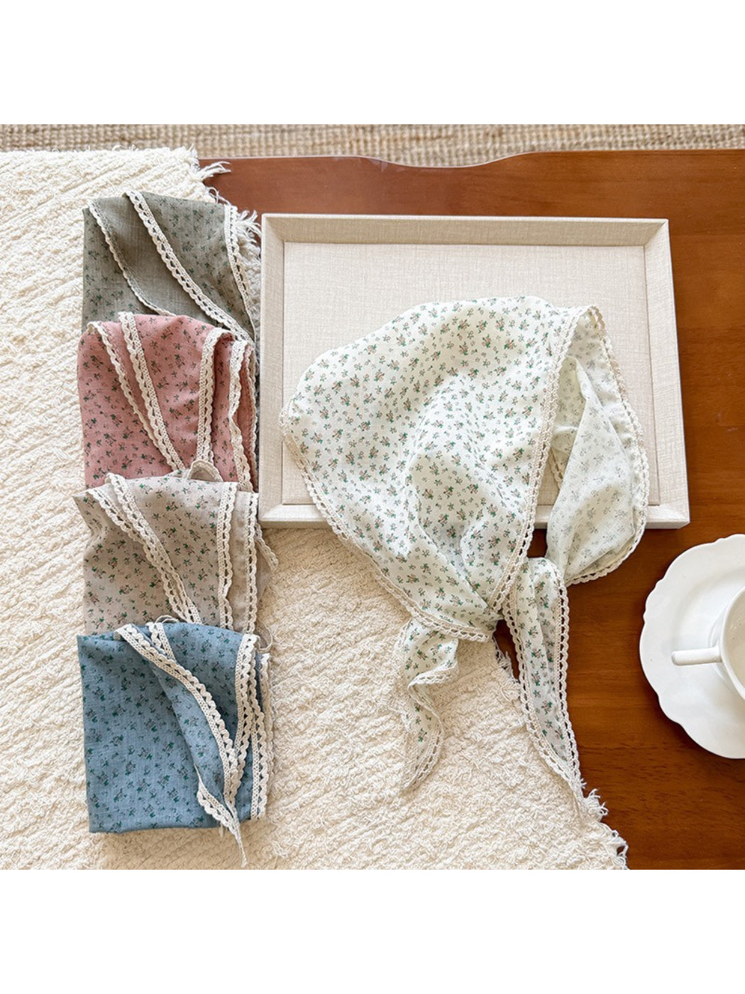 Scarvii ditsy floral lace tie headscarf folded on a white background