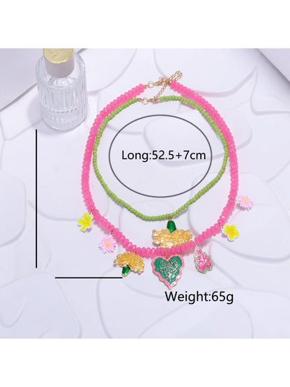 Neckit Summer Fruit Necklace displayed on a white background showing fruit and floral charms