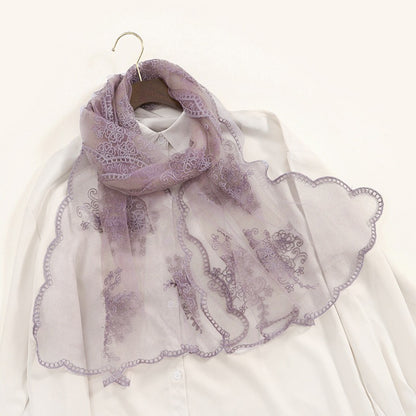 Scarvii scarf displayed on mannequin highlighting sheer fabric and embroidery